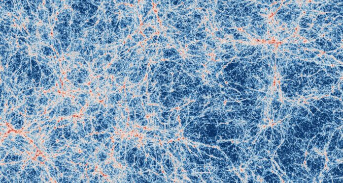 Imagen de una gran región del universo predicha por simulaciones basadas en el modelo cosmológico actual y realizadas con supercomputadoras. En blanco el tenue resplandor del gas presente en los filamentos cósmicos. En la intersección de estos filamentos, en rojo se encuentra el gas dentro de las galaxias, que da origen a nuevas estrellas (Foto: Alejandro Benítez-Llambay/Universidad de Milán-Bicocca).